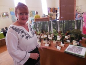 Avril Marriott of Huntington showed her handmade whimsical mice characters at the Hilltown Artisans Guild show in Worthington this weekend. (Photo by Amy Porter)