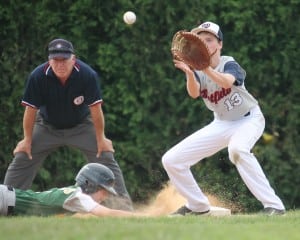 Westfield Babe Ruth Baseball 13-Year-Old All-Stars first baseman David Roundy, right, looks to make a defensive play during an eastern regionals tournament game against Burlington, Vt., Monday. (Photo by Kristen Koziol)
