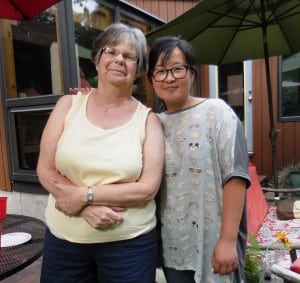 Andrea Cook-Hewitt of Westfield hosted the group’s chaperone, Xuan “Tanya” Zhou, who teaches English in a small city near Shanghai in China. (Photo by Amy Porter)