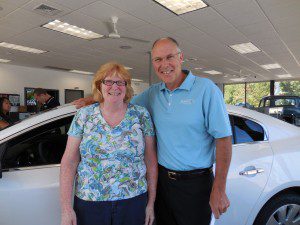 Judy Whalen, office manager at Bob Pion Buick GMC with Don Pion.  Whalen has worked for the dealership for 23 years, and plans to retire there. (Photo by Amy Porter)