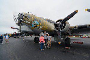 The Webster family of Westhampton, Daniel, Harmony, Jacque, and Duncan, get ready to take a look in a B-17G at the Wings of Freedom Tour display Sunday at Barnes Airport.(Photo by Marc St. Onge)