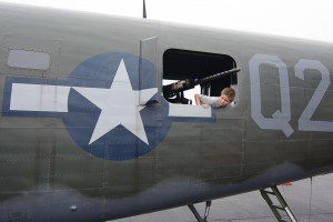 Duncan Webster of Westhampton looks out the gun port of the B-17 Flying Fortress.(Photo by Marc St. Onge)
