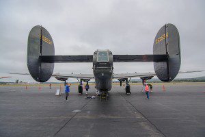 Visitors check out the tail section of the B-17 Flying Fortress during the Wings of Freedom Tour display Sunday at Barnes Airport.(Photo by Marc St. Onge)