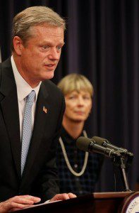 Massachusetts Gov. Charlie Baker answer questions regarding the results of a probe into Hardwick child abuse case during a press conference Friday, Sept. 4, 2015, at the State House in Boston. The Department of Children and Families failed to protect a 7-year-old boy who police say was beaten and starved by his father and who is now in a coma, according to a report released Friday. Secretary of Health and Human Services Marylou Sudders is at right. (Craig F. Walker/The Boston Globe via AP)