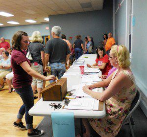 Huntington residents vote by paper ballot. (Photo by Amy Porter)