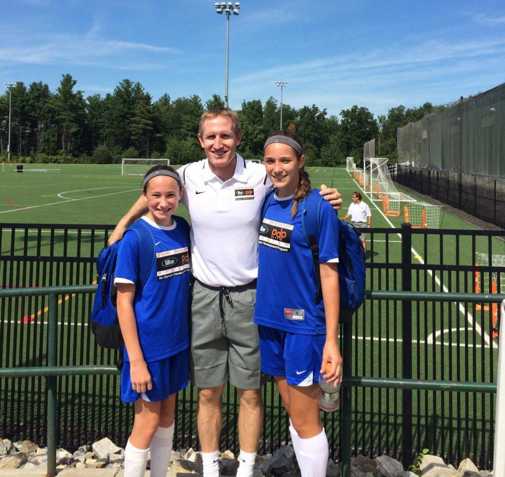Catherine Bean and Delaney Miles flank John Curtis, Technical Director of PDP Coaching. Curtis is a former Manchester United and Blackburn Rovers player, who was recently selected by US Soccer for the development of soccer players in the Northeast. Catie and Delaney were two of 30 young girls nominated in New England by their premier club, FC Stars of Massachusetts to participate in the New England Premiership, Player Development Program (NEP, PDP) training in Marlborough. The NEP, PDP is a player development platform, within US Club Soccer's id2 program, that is designed to assist NEP member clubs in the development and showcasing of each clubs most promising players. It is a highly selective program administered, funded and delivered entirely by the NEP on behalf its members. (Submitted Photo)