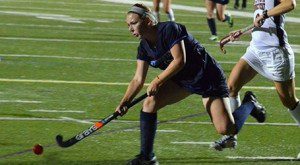 Holly Brouillette attacks cage. (Photo courtesy of Westfield State)