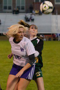 Westfield Technical Academy (white/purple jerseys) and St. Mary (green/white) made some head-turning plays in a high school girls' soccer game Tuesday night at Bullens Field. (Staff Photo)