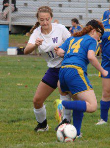 Westfield Technical Academy’s Heather Lannon (11) jostles for possession of the ball against Pathfinder Thursday at Jachym Field. (Photo by Chris Putz)