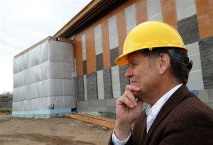 The R. W. Kern Center at Hampshire College is under construction on the Amherst campus. Slated to open in March 2016, the building intends to achieve full Living Building Certification, which requires net-zero energy, waste and water systems. The facility is on the leading edge of sustainable architecture according to the college. Here is Hampshire College President Jonathan Lash leading a tour of the facility. (Dave Roback/The Republican of Springfield via AP)