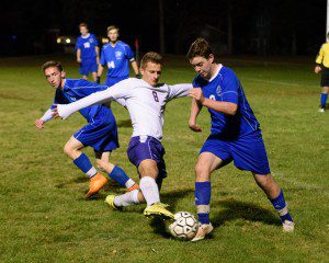 Tigers' Alex Stepanchuk (8) slips through the Upper Cape Cod Tech defense Monday night at Bullens Field. (Photo by Marc St. Onge)