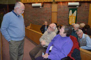 Dr. Robert Brown chats with Frank and Sharon Tompkins prior to his lecture titled "A History of Downtown Westfield" on Wednesday night. (Photo by Lori Szepelak)