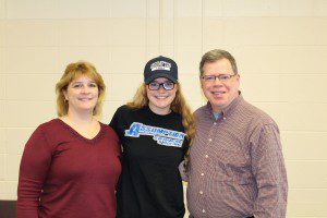 The Johnstone Family on Kelsey's national signing day with the Assumption College swim team. (Submitted photo)