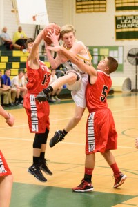 Southwick's Matt Daley makes an acrobatic move against Athol on Monday night. (Photo by Marc St. Onge)