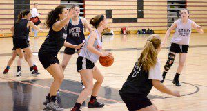 Players for the Westfield High School girls' basketball team practice Monday. (Photo by Chris Putz)