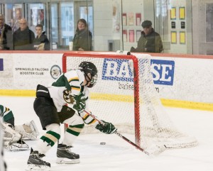 St. Mary's Shaun Gezotis blazes past the defense en route to scoring one of three first-period goals in a game earlier this year. The Saints are one of three local hockey teams which will face a unique set of challenges this postseason. (File Photo by Bill Deren)
