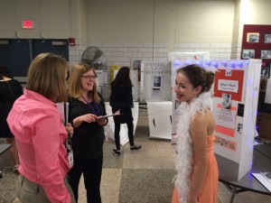 Seventh grader Kaitlynn Brooks, at right, chats with Southwick Regional School teachers Beatrice Pratt and Megan Whalen during the Person In History Fair Wednesday. (Photo by Hope E. Tremblay)