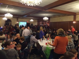 Roma Restaurant is crowded with supporters of Team Justice Jan. 30 during a fundraiser for the motocross team. (Photo by Hope E. Tremblay)