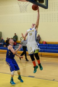 Gateway's Pete Kowal goes up for a lay-up against Pathfinder Tuesday night in the Gator Pit. (Photo by Marc St. Onge)
