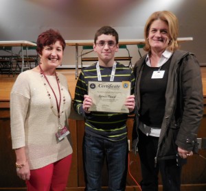 (L-R) North Middle School Geography Bee leader Rebecca Wood, Bee winner Antonio Phaneuf, and proud mom Maureen Phaneuf. (Photo by Amy Porter)