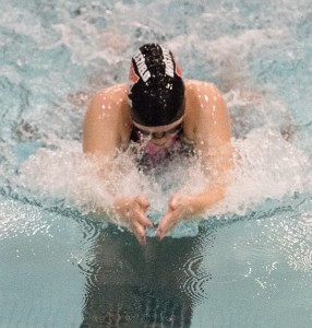 Westfield's Kelsey Johnstone swimming to her second place finish in the 100 breaststroke. (Photo by Bill Deren)