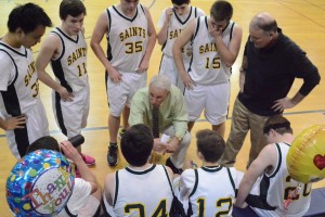 St. Mary High School boys' basketball head coach Joe Molta, center, instructs his players Wednesday night at Westfield Middle School South. (Photo by Lynn F. Boscher)