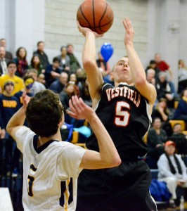 Westfield's John O'Brien (5) hoists a one-handed shot against the Blue Devils Thursday night. (Photo by Chris Putz)