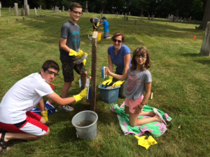 The Scott family, William, Andrew, Sarah and Nora, were on hand last year at the annual clean-up day at The Old Burying Ground.