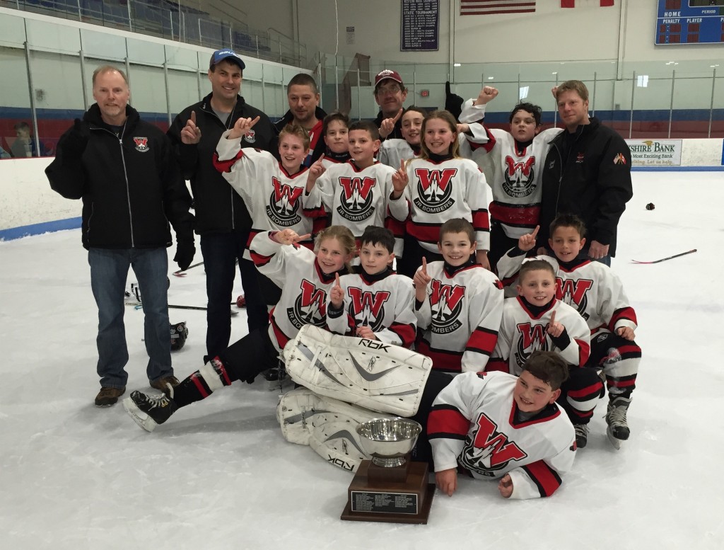 The Westfield Youth Hockey Squirt 1 team won the GSL championship March 13. The 2016 champions are, from left to right: (front center) George Kimball; (second row) Katie Collins, Ethan Marowitz, Evan Grant, and Brayden Czarnecki; (third row) Bryce Russ, Jacob Jarrell, Gwenn Hosmer, and Francis Powers; (fourth row) Coach Kevin Czarnecki, Coach Mark Hosmer, Coach Joe Czarnecki, Cole Chapman, Coach Fran Powers, Aaron Hooben, Nathan Sarabaez, and Coach Carl Russ. (Submitted photo)