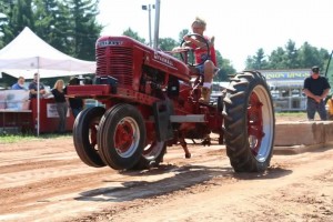 Elizabeth Massa of Russell is "hooked" on tractor pulls and will be participating in the Western Mass. Tractor Pullers Association's competition May 15. (Photo courtesy of Rick Shea)