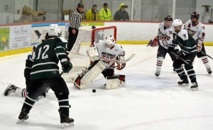 Westfield goalie Cameron Parent attempts to make a save in a January 6 home game against Minnechaug. (Staff File Photo)