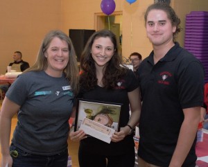 Andrea Allard presents first-prize in the chowder category to the Shortstop Bar & Grill's chef Monica Hannoush.