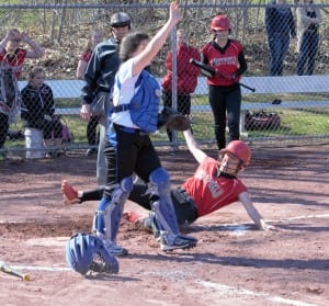 Westfield's Morgan Zabielski slides into home for another run Wednesday against Chicopee Comp. (Photo by Lynn Boscher)