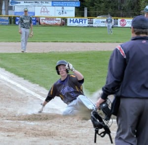 Westfield Tech's Andy Daniels slides into home plate for another run against McCann Tech Thursday at Bullens Field. (Photo by Lynn Boscher)