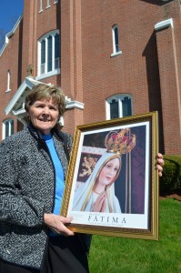 Alicia Belanger of Saint Peter & Saint Casimir Church in Westfield encourages area residents to visit the church on April 25 when the International Pilgrim Virgin Statue of Our Lady of Fatima stops on its U.S. tour of peace.