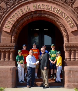 Westfield Babe Ruth Baseball League President Dan Welch, left-center, and Westfield Mayor Brian P. Sullivan, right-center, stand alongside Babe Ruth ball players to kick off ticket sales for the 14-Year-Old World Series Aug. 9-19 at Bullens Field. (Photo by Chris Putz)