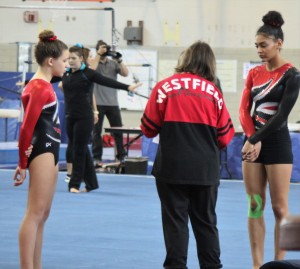 Westfield's Nicole Marek and Bianca Hiltz get a pep talk from their coach. (Photo by Kellie Adam)