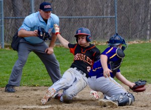 Belchertown’s Jackson Dziel just beats the tag of Westfield Tech catcher Chris Boyden Friday. (Photo by Chris Putz)