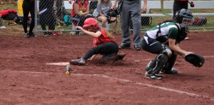 Westfield's Kelsey Kiltonic slides safely into home plate Friday. (Photo by Kellie Adams)