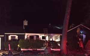 Westfield firefighters work to put out a fire at 150 Western Circle Sunday night. Photo by witness Patrick Lurgio. Used with permission.