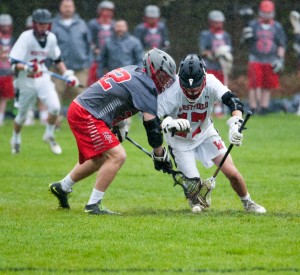 The Westfield and Pope Francis boys' lacrosse teams squared off on a dreary day Friday in the Whip City. The final resulted brightened the Bombers' day though. (Photo by Bill Deren)