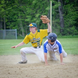 St. Mary's Jack Masciadrelli tries to make the tag at third against Gateway in a high school baseball game Monday in Huntington. (Photo by Marc St. Onge)