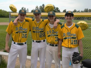 St. Mary High School senior baseball players, from left to right, Bobby Gonet (16), Kyle Koloski (22), Billy Lamirande (3), and Matt Hanoush (19) join arms in celebrating “Senior Day” Thursday at Westfield Middle School North. (Photo by Lynn F. Boscher)