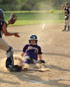 Westfield Technical Academy's Cheyenne Slack slides into home plate ahead of the throw from Putnam Thursday at Whitney Field. (Photo by Kellie Adam)