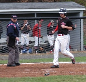Westfield's Austin St. Pierre scores a run for the Bombers in the fourth inning Wednesday at Longmeadow High. (Photo by Jeff Hanouille) 