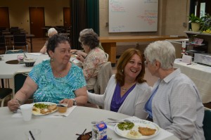 Cindy Sullivan, director of the Southwick Council on Aging, chats with Donna Sharron and Barbara Mickna during lunch on Wednesday.