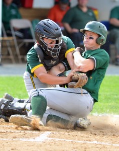 Southwick High School baseball catcher Jake Goodreau applies the tag at home plate. (Westfield News Staff Photo)