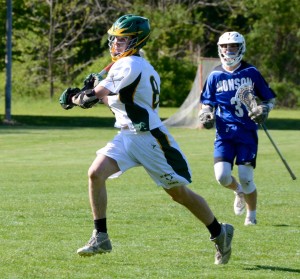 STM8shot.jpg St. Mary’s Padraig Smith left, uncorks a shot. A Monson defender, right, looks on. (Photo by Chris Putz)