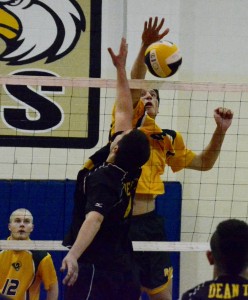 Southwick’s Ryan Todesco attempts to land a devastating kill against Dean Tech. (Photo by Chris Putz)