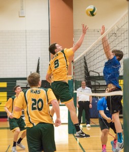 Southwick's Ryan Todesco (8) skies high above the net and the competition in Wednesday's high school boys' volleyball match against visiting West Springfield. (Photo by Bill Deren)